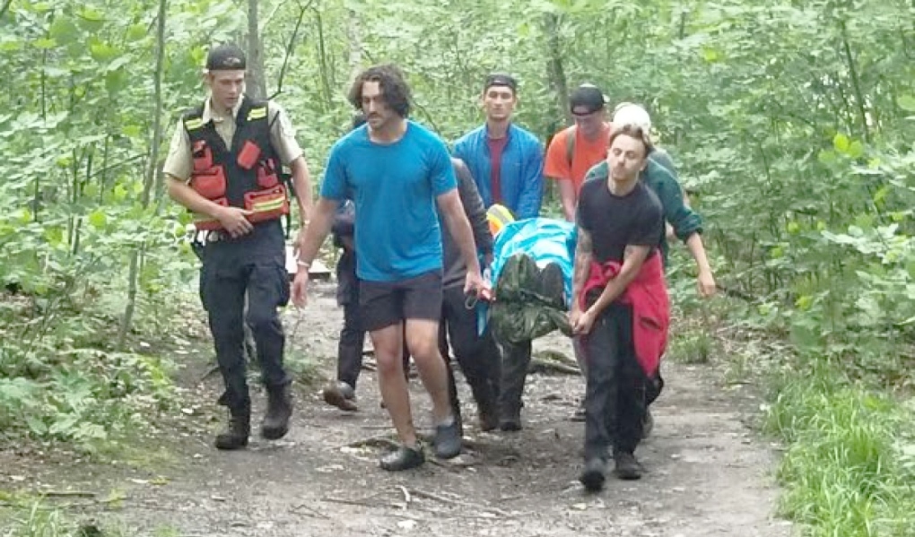 Ontario Provincial Police in Noëlville are thanking a group of nine hikers who carried an injured person through the bush and to a waiting Ornge helicopter. The incident took place July 1 in Killarney Provincial Park. (Supplied)