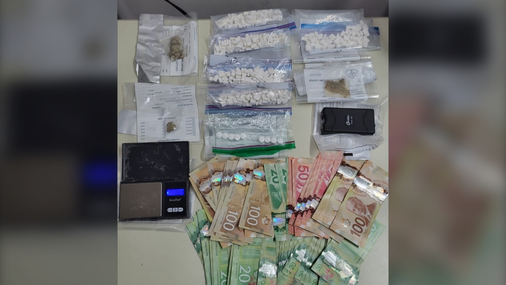 Drug bust in Cobalt results in seizure of cash, suspected fentanyl, methamphetamine, oxycodone, drug paraphernalia and a prohibited weapon. (Ontario Provincial Police)