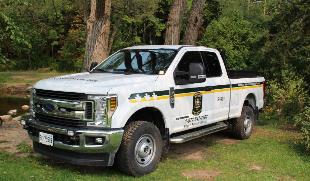 Ministry of Natural Resources and Forestry conversation officer vehicle parked near water. (Supplied/file photo)