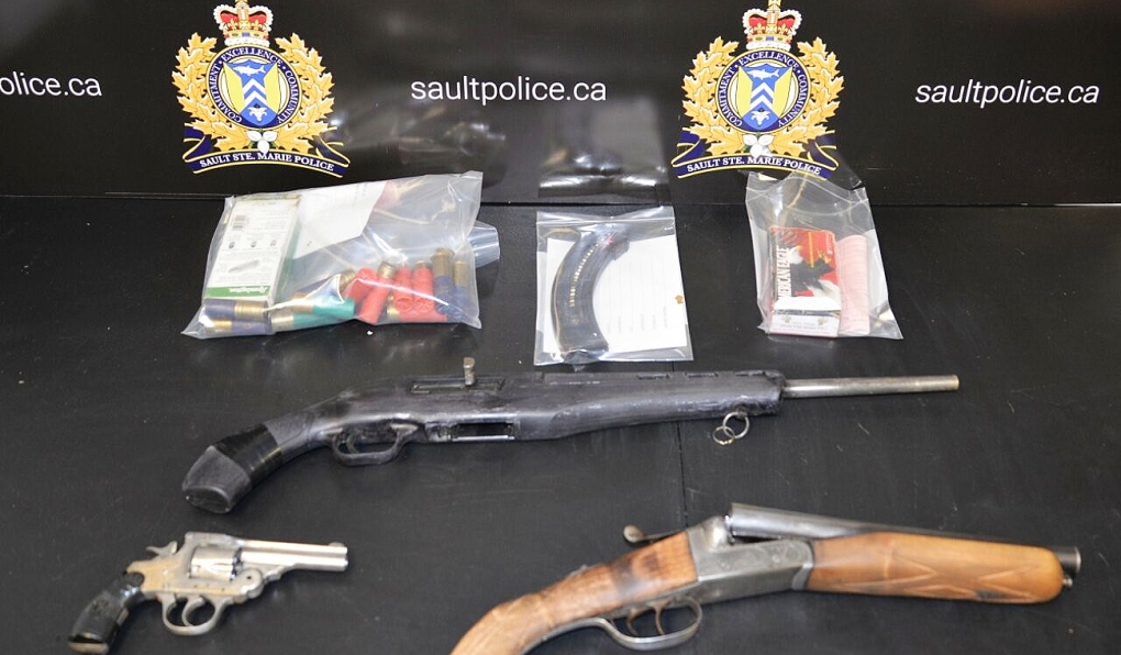 The weapons seized by police included a sawed-off double barrel shotgun, a sawed-off Mossberg rifle, a revolver and ammunition for all three weapons. (Supplied)