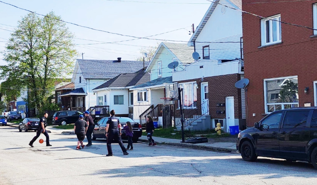 Sudbury police received a noise complaint Sunday morning that children playing outside were making too much noise. Police arrived and ended up joining the 'noisy' street basketball game. (Photos courtesy of Greater Sudbury Police)