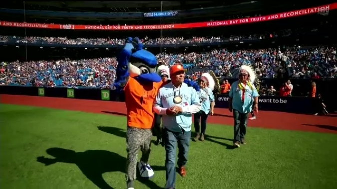Residential school survivor throws first pitch at Jays game for Orange Shirt  Day 