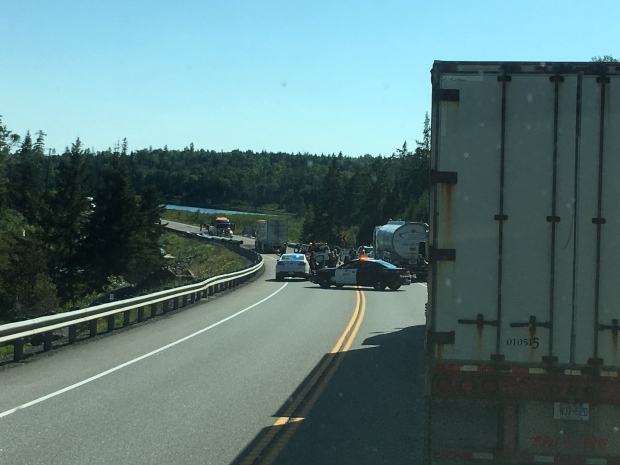 Tractor trailer loses load on Highway 11