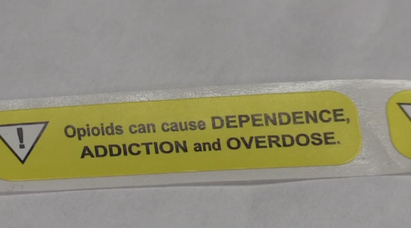 Opioid warning label