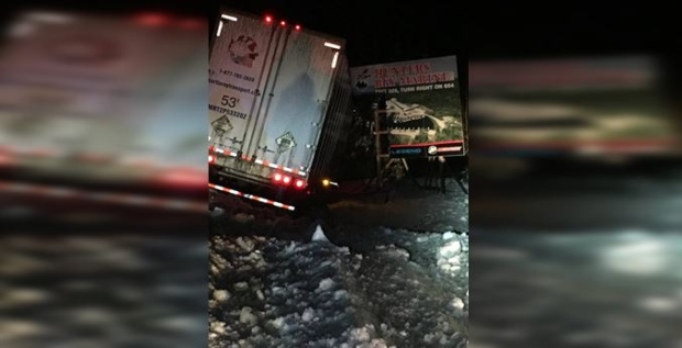 Transport truck in ditch overnight on Highway 11
