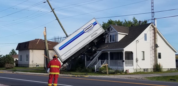 Commercial truck crashes in Alban
