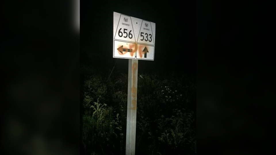 'OPP PIGS' spray painted on some Mattawa signs