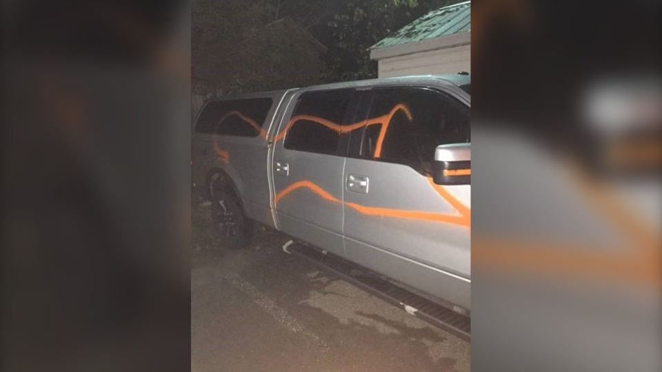 Truck parked behind OPP detachment spray painted