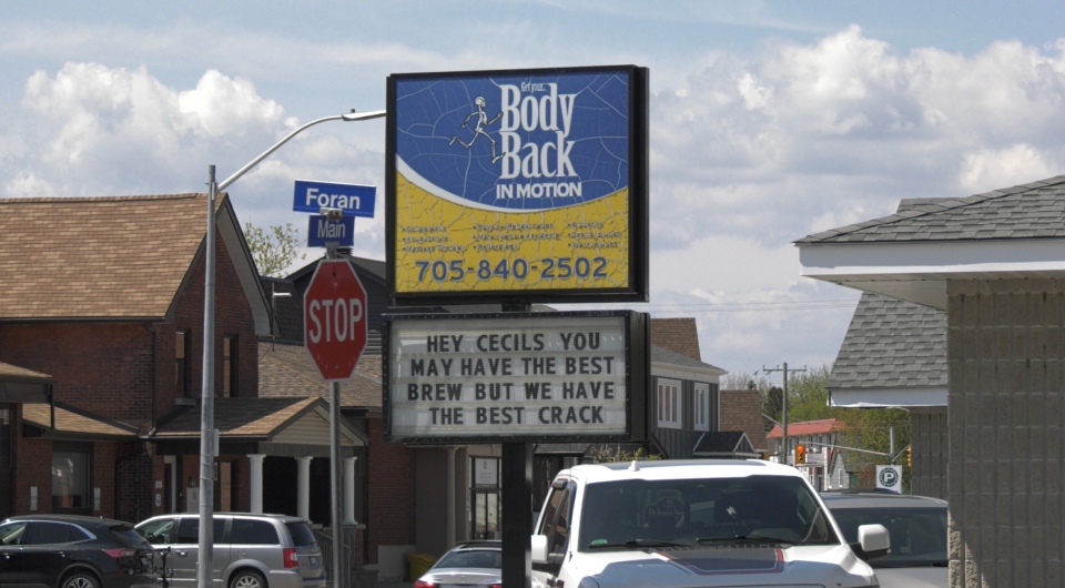 North Bay chiropractor's sign takes aim