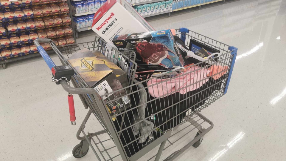 Shopping cart full of merchandise at Walmart